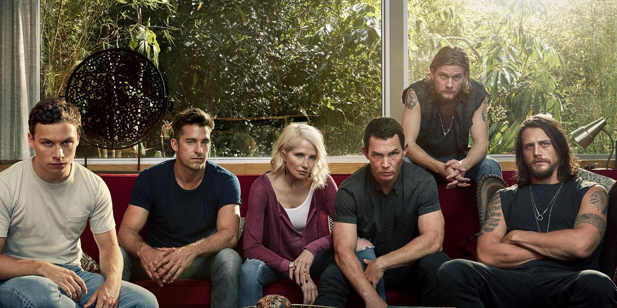 Still image of ensemble cast of the TV series Animal Kingdom starring Ellen Barkin and Shawn Hatosy