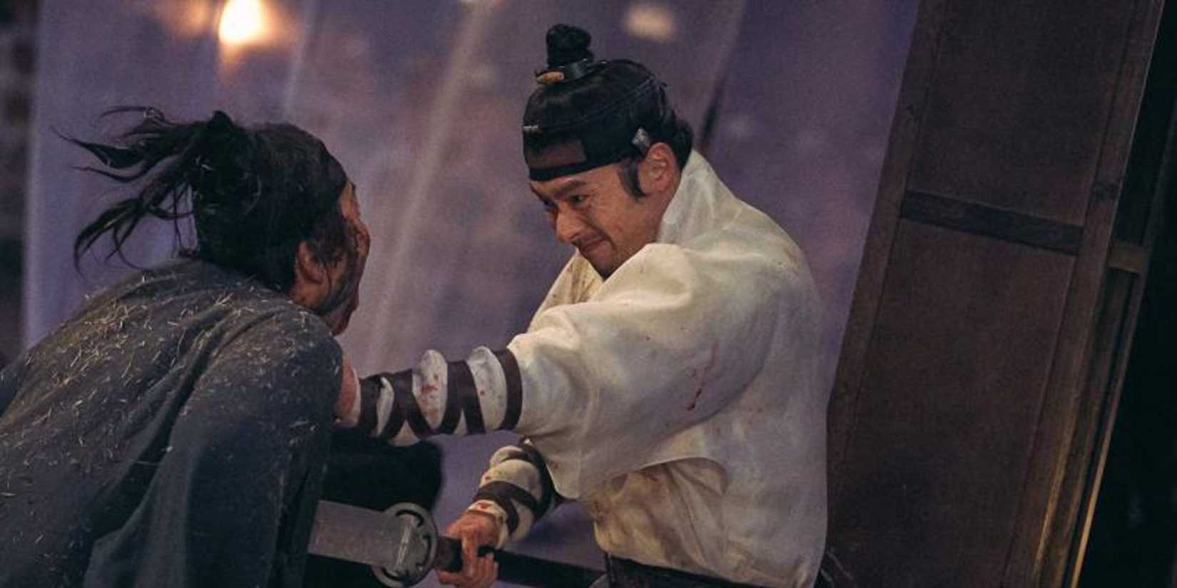The Prince is killing a zombie