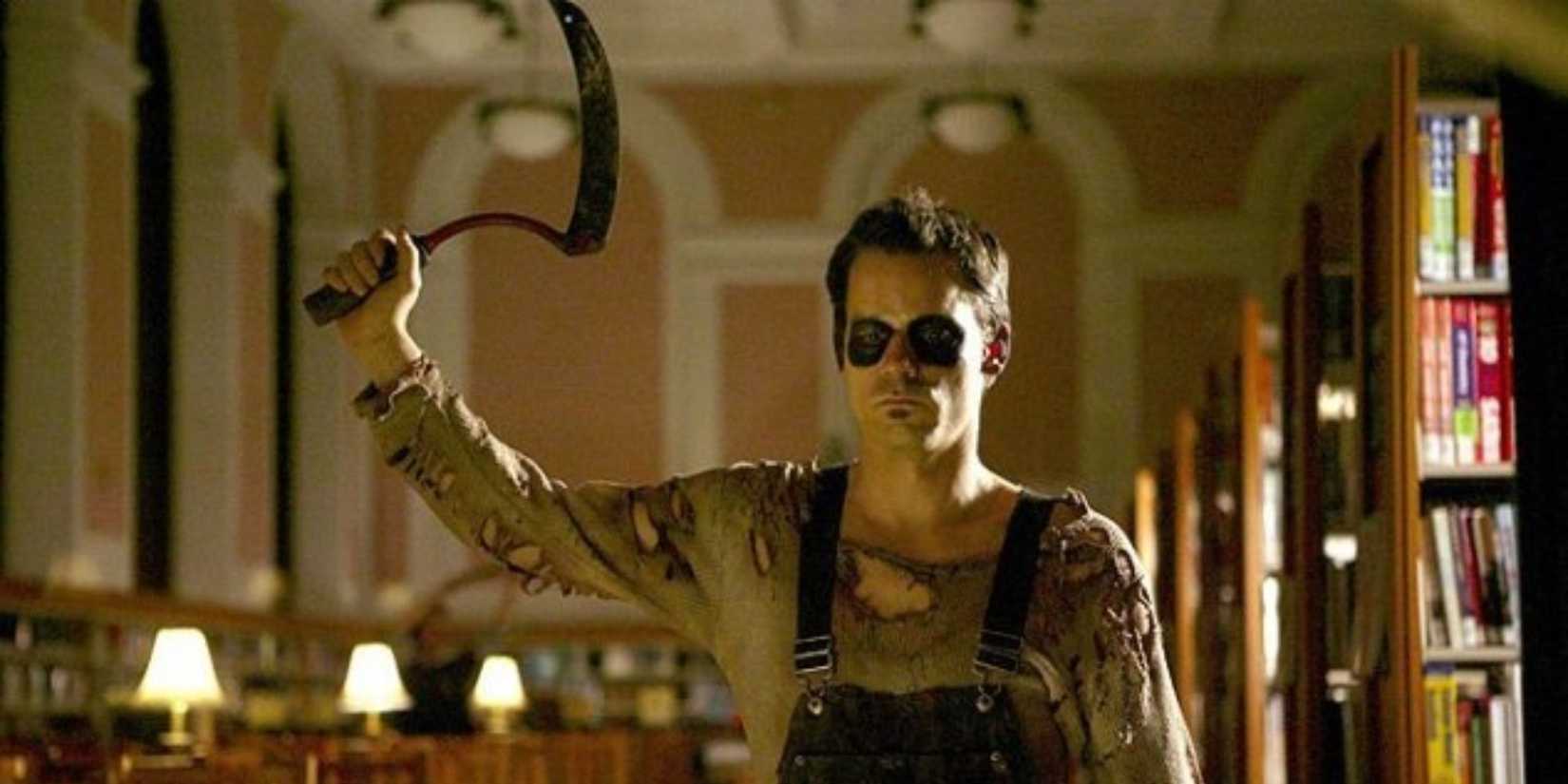 Nathan Baesel holding a sickle in Behind the Mask: The Rise of Leslie Vernon