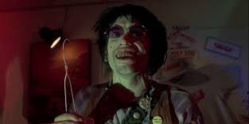 Chop-Top (Bill Moseley) laughs as he terrorizes the radio station in Texas Chainsaw Massacre 2 (1986)
