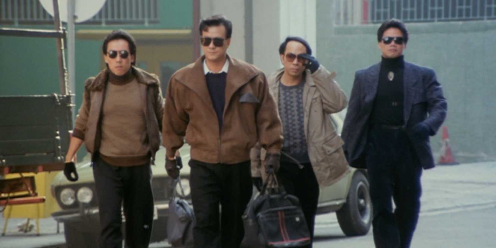 A group of men walking in City on Fire