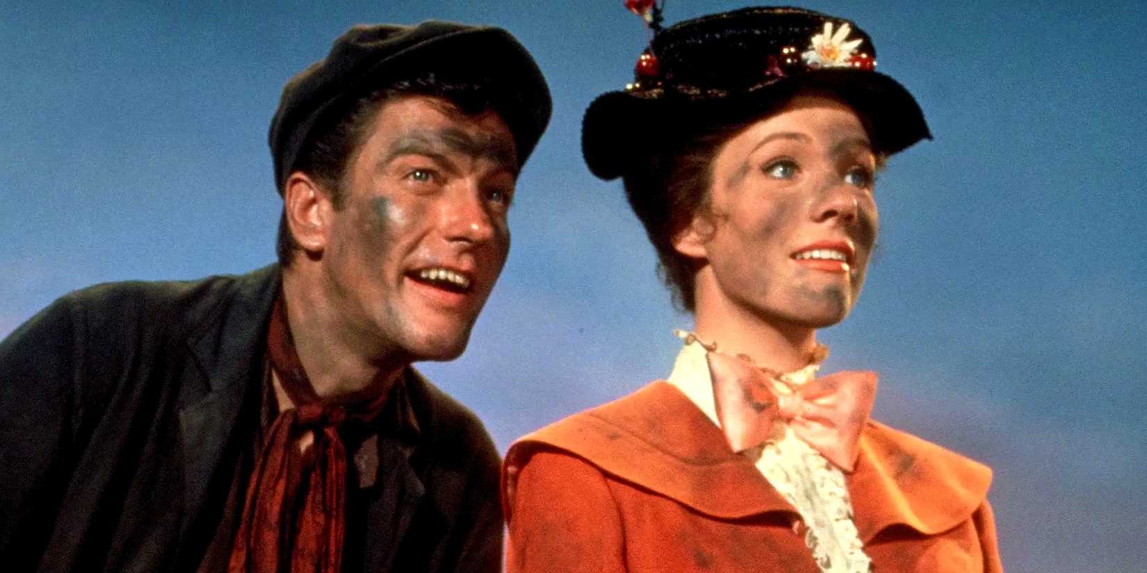 Bert (Dick Van Dyke) and Mary Poppins (Julie Andrews) covered in soot look into the distance in Mary Poppins