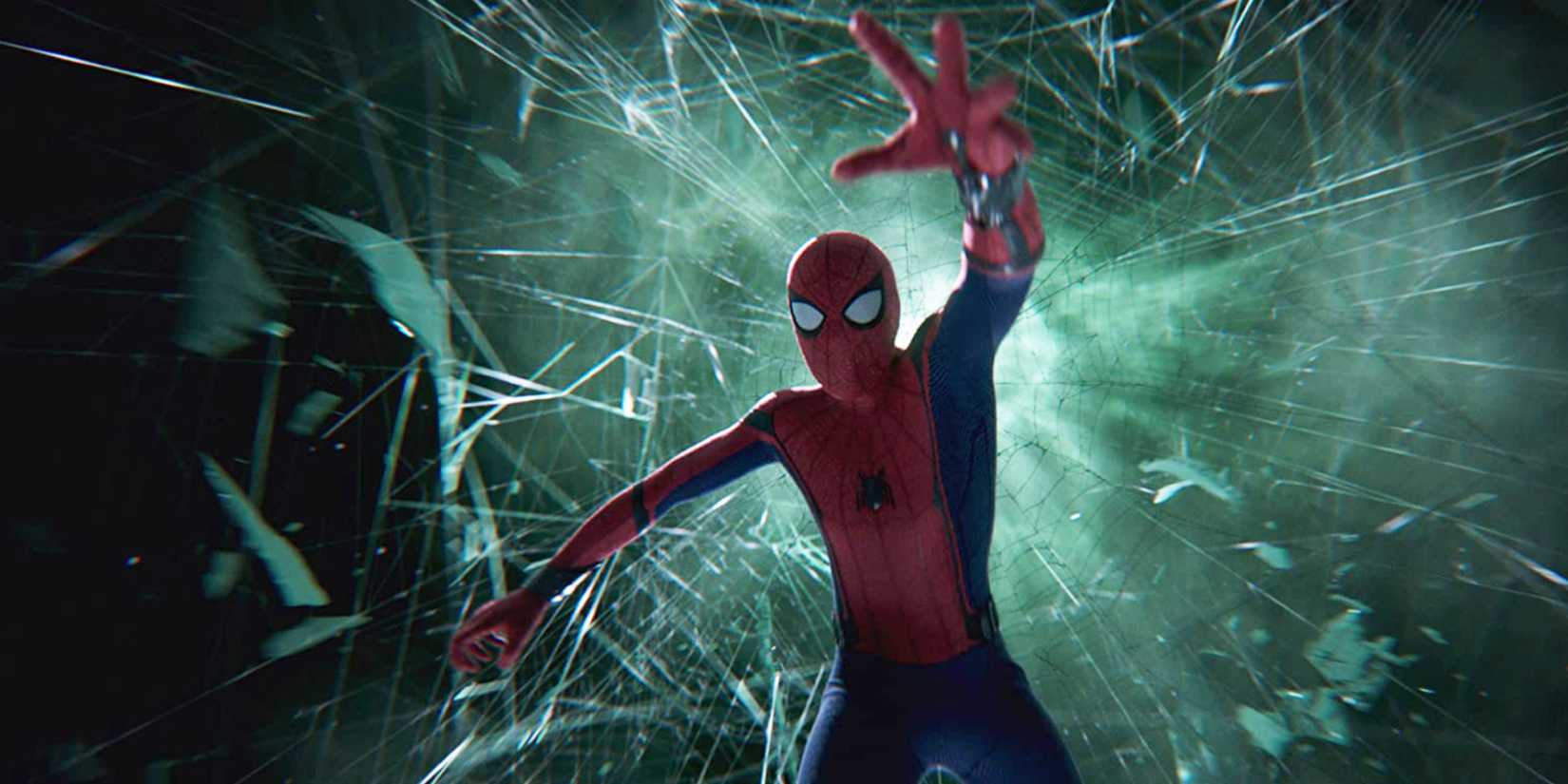 Spider-Man falling through a glass surrounding by green smoke in 'Spider-Man: Far From Home'