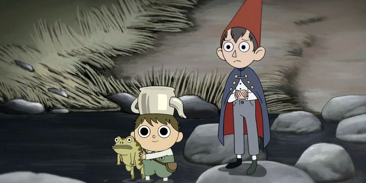 Little boy Greg with a teapot on his head, holds a green frog. Wirt, worried and his hands crossed, stands behind him. They both stand on rocks, crossing a river.
