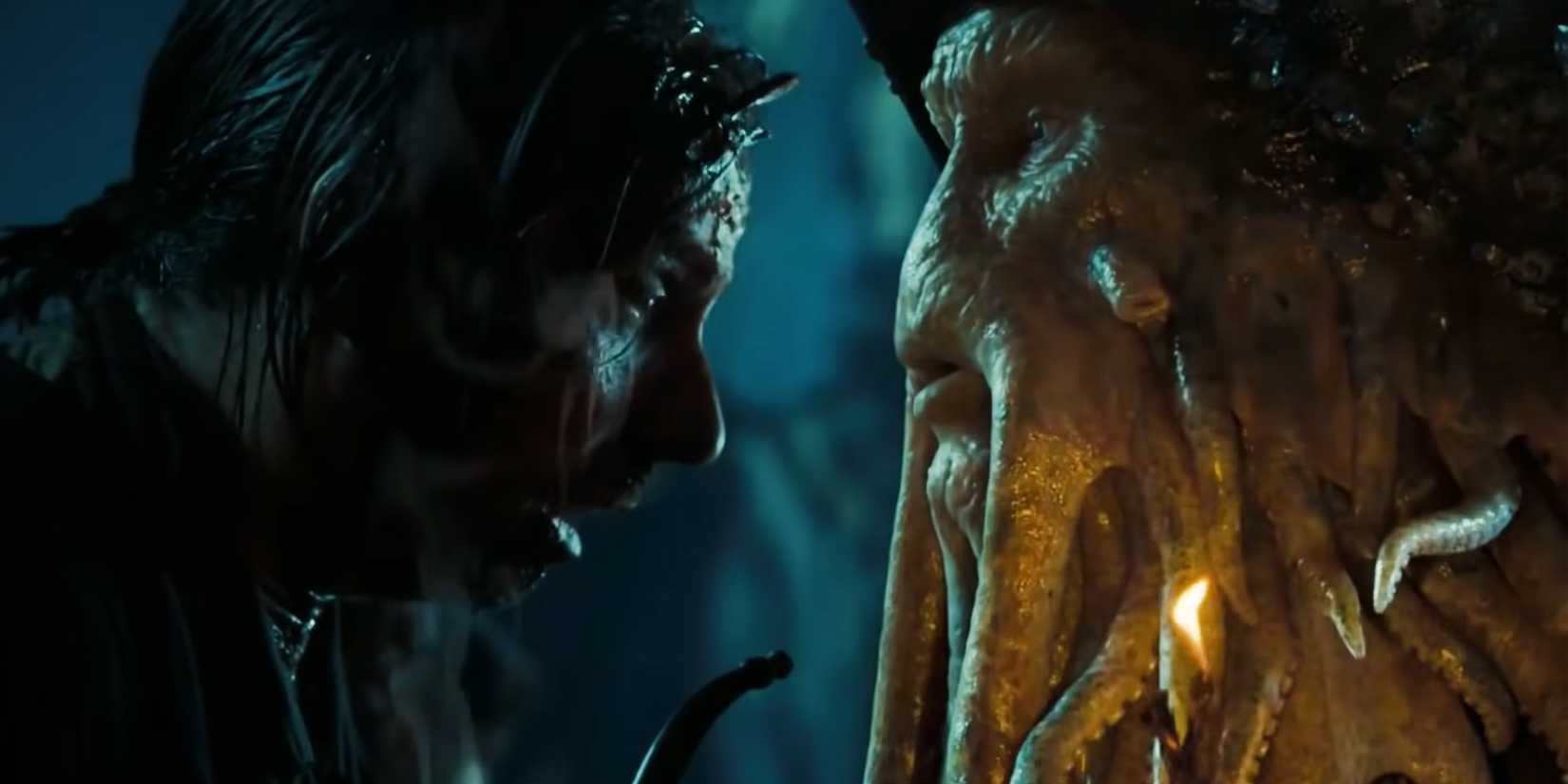 Davy Jones facing a man in Pirates of the Caribbean Dead Man's Chest