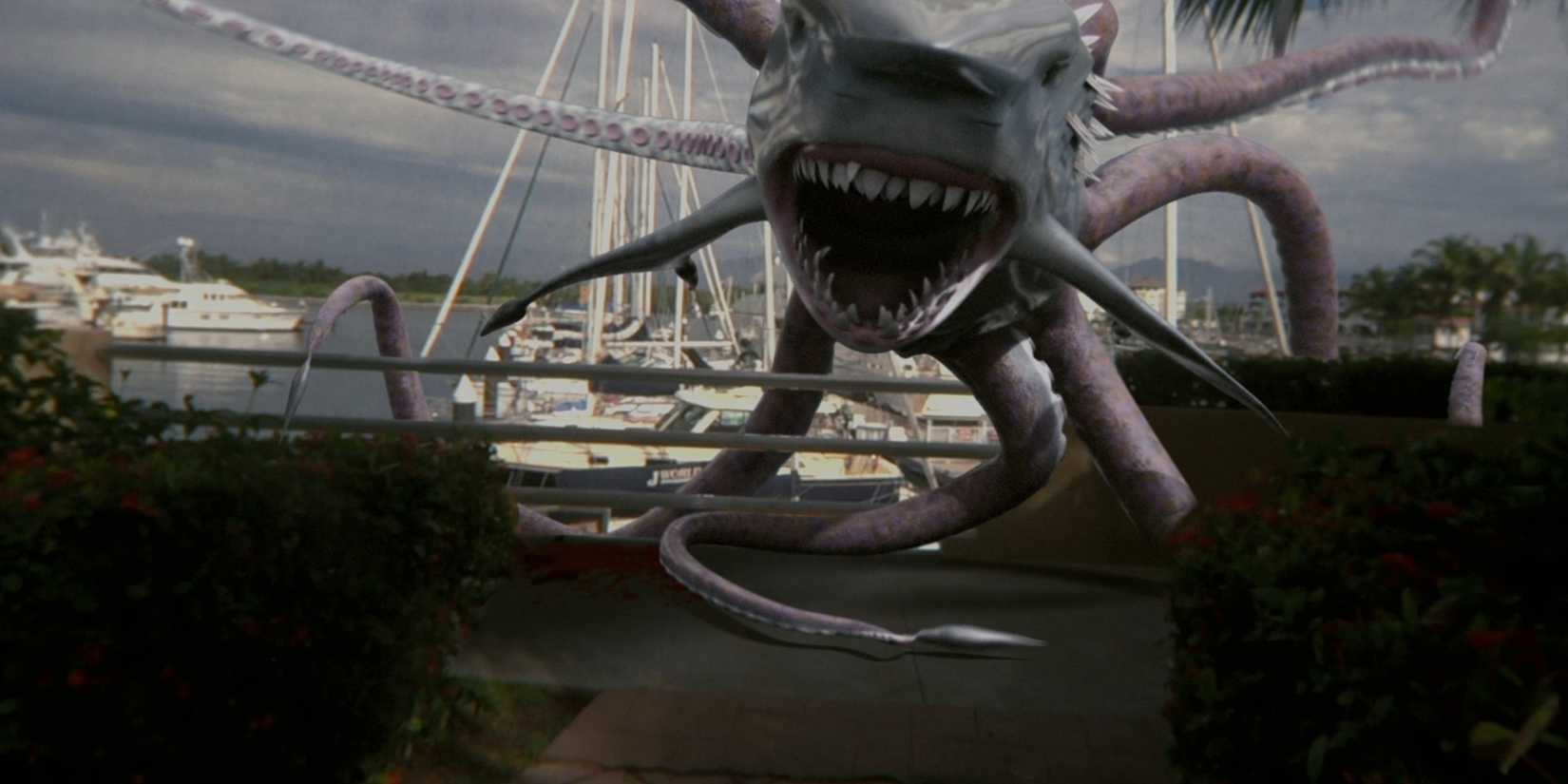 Sharktopus climbing gate and heading down sidewalk