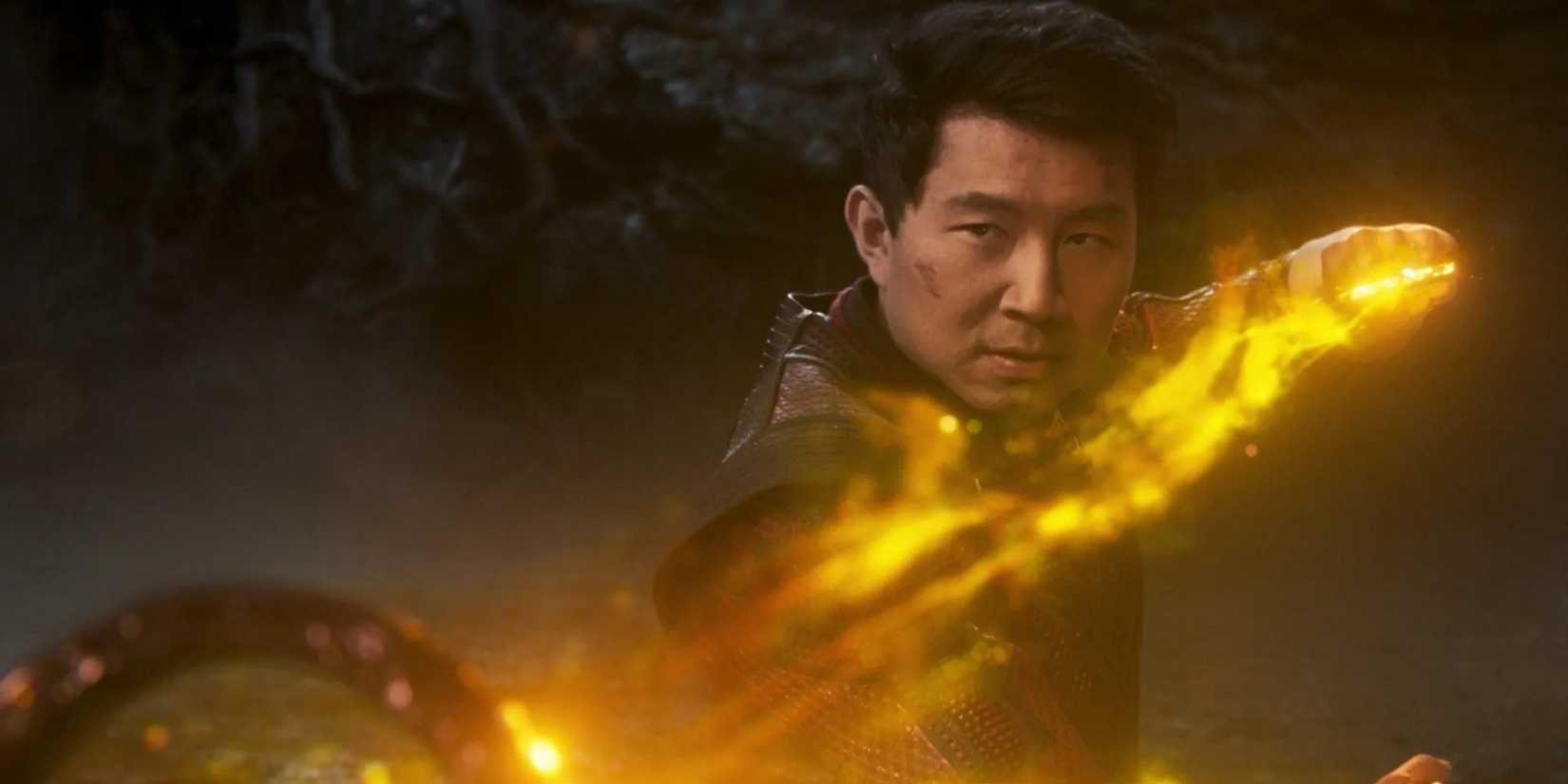 Simu Liu as Shang-Chi wielding the ten rings in Shang-Chi and the Legend of the Ten Rings.