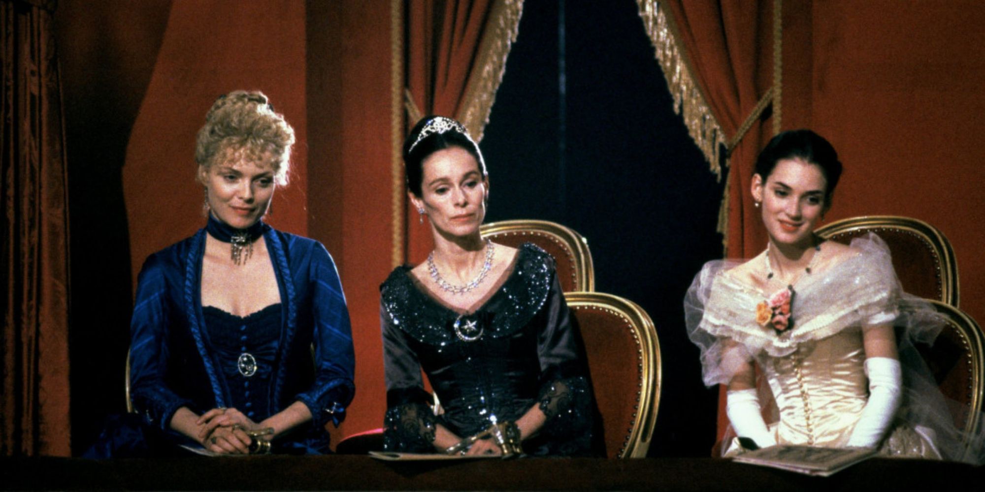 Three women sitting next to each other in The Age of Innocence.