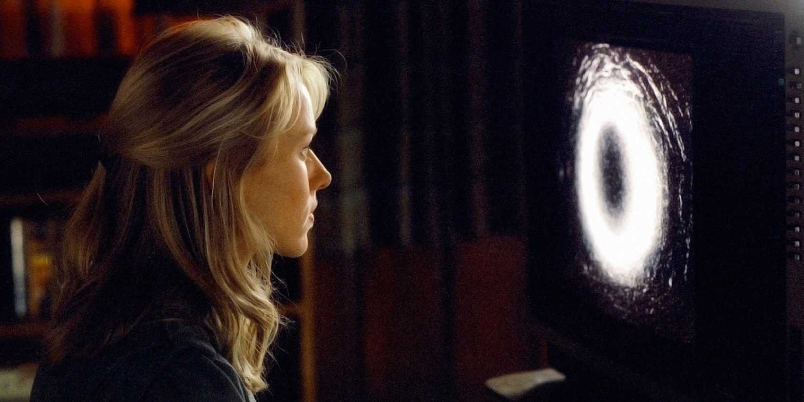 A woman watching the cursed tape