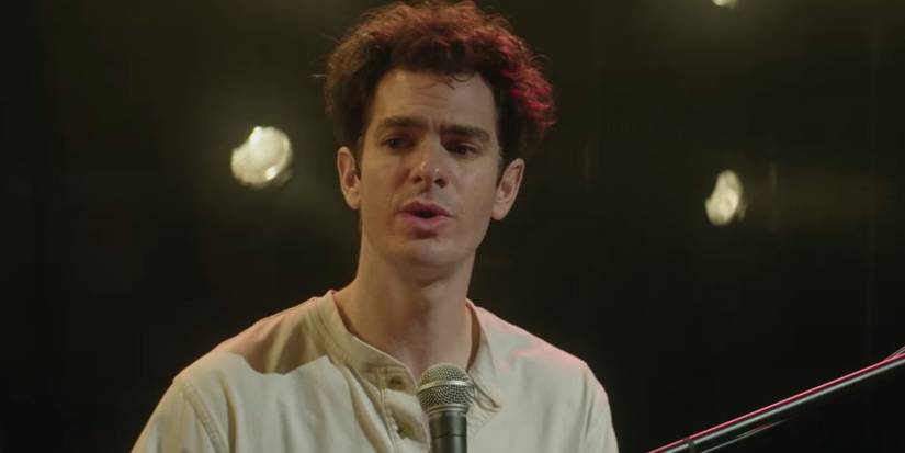 Jonathan Larson singing on stage in Tick-Tick-Boom