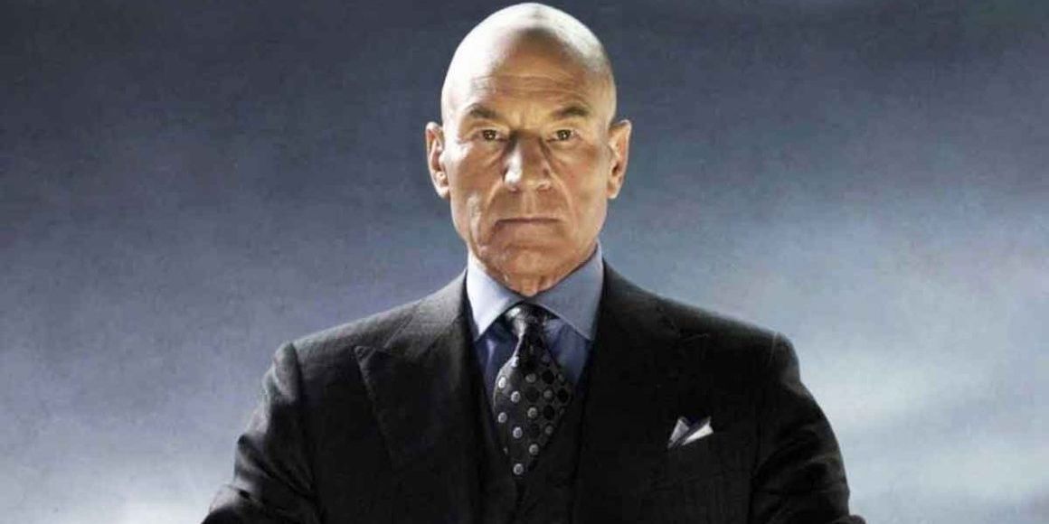 Patrick Stewart as Professor Charles Xavier sits in front of a silver backdrop. 