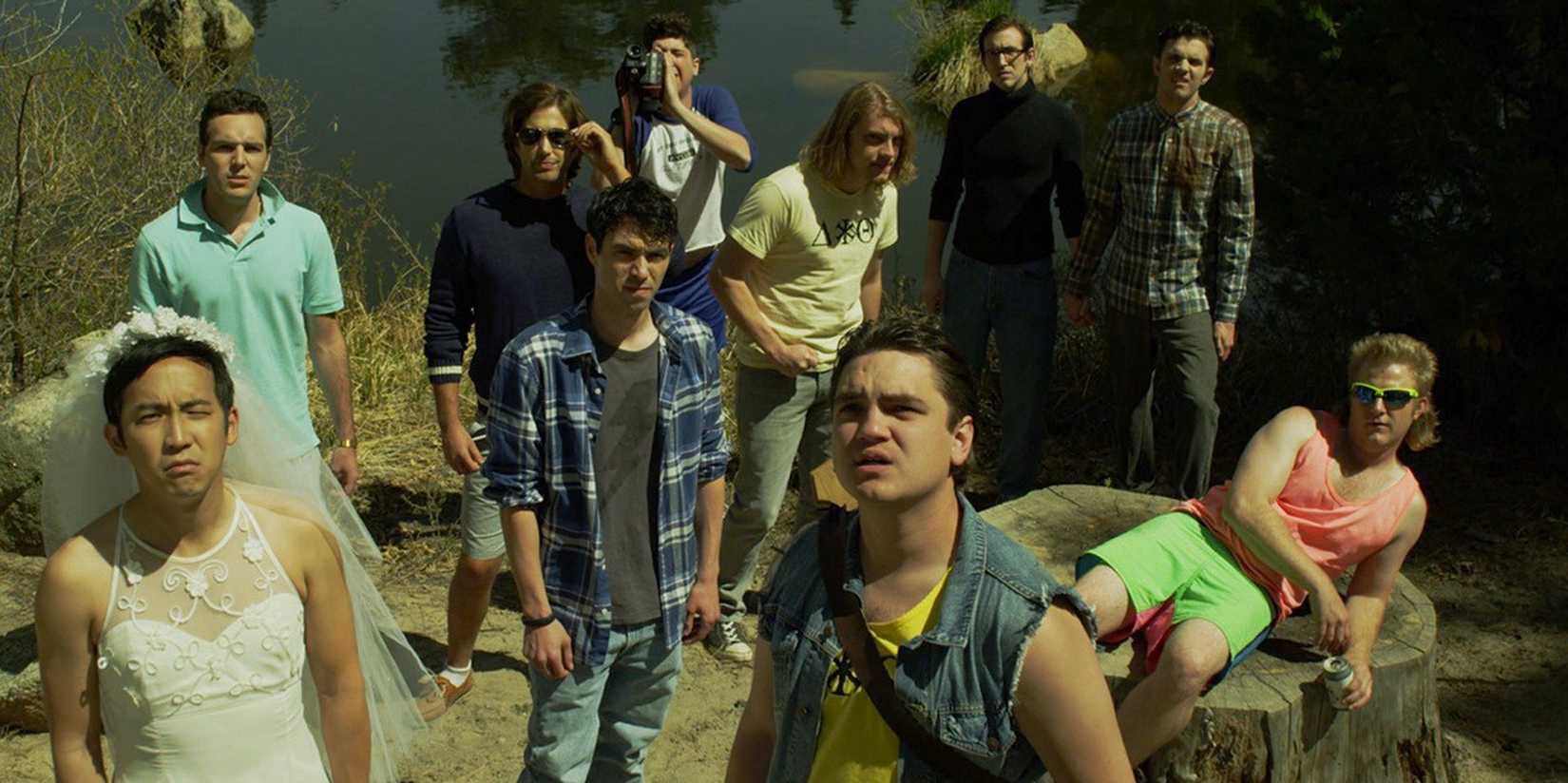 The cast of Dude Bro Party Massacre III standing by a lake