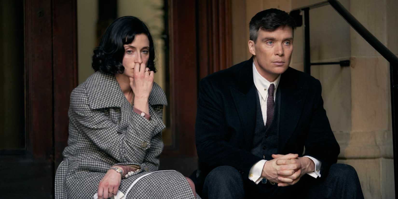 Cillian Murphy as Tommy Shelby and Natasha O'Keeffe as Lizzie Stark sitting on the hospital stairs in Peaky Blinders Season 6