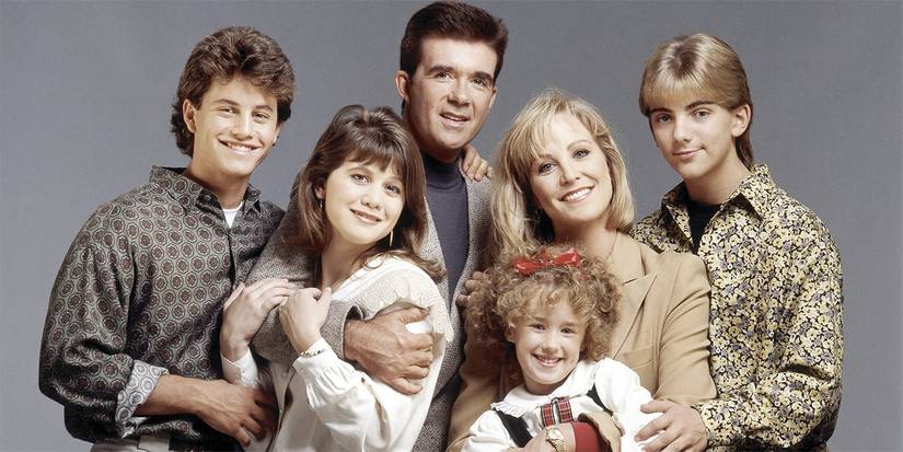The cast of 'Growing Pains' posing for a family photo