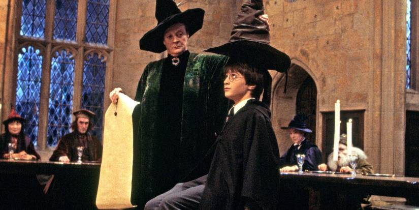 Daniel Radcliffe as Harry Potter getting sorted in his house in Harry Potter and the Sorcerer's Stone.