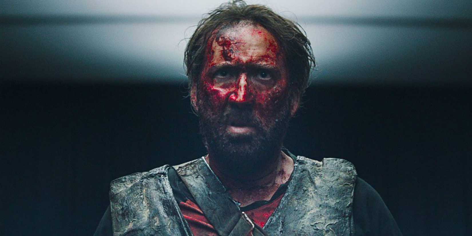 Nicolas Cage with blood on his face in Mandy