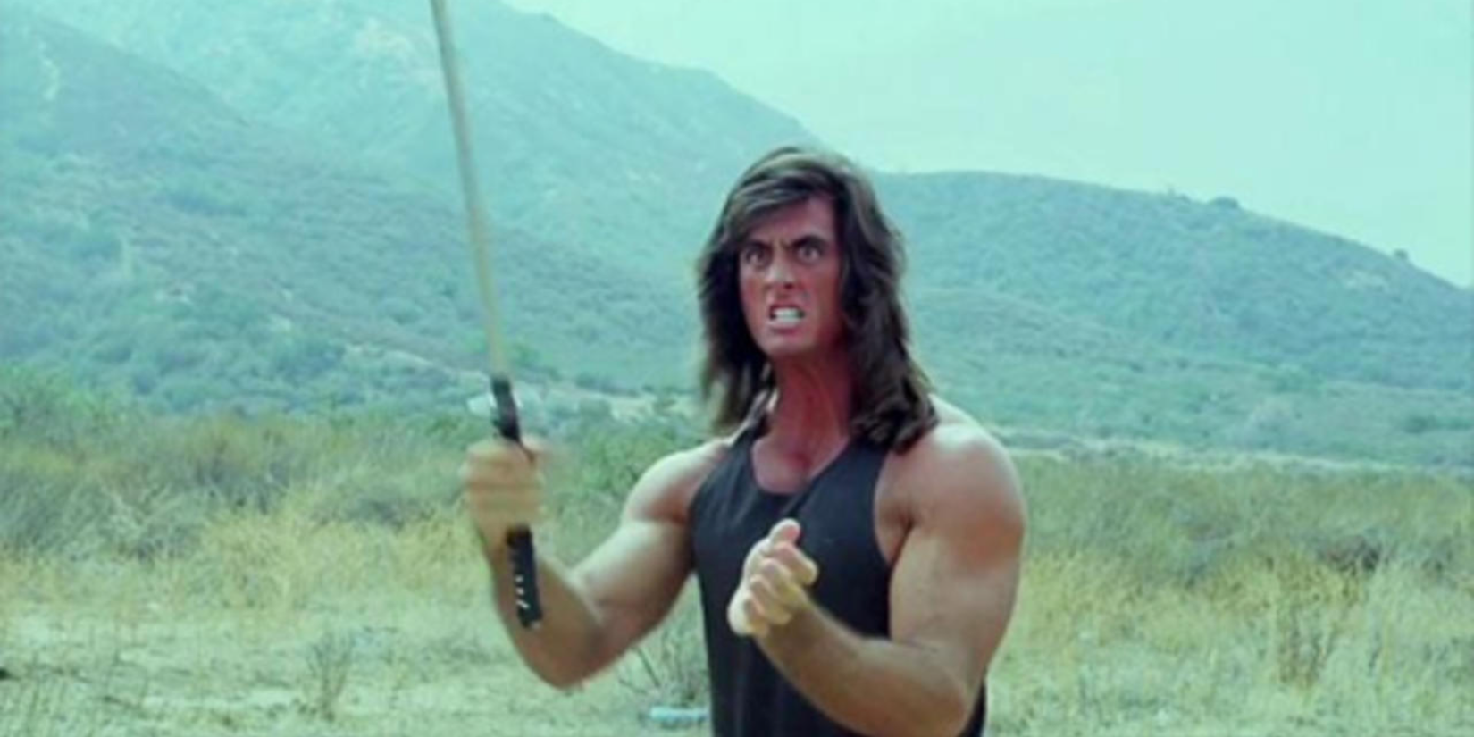 samurai cop joe marshall stand in the hills with his sword as he faces his enemy