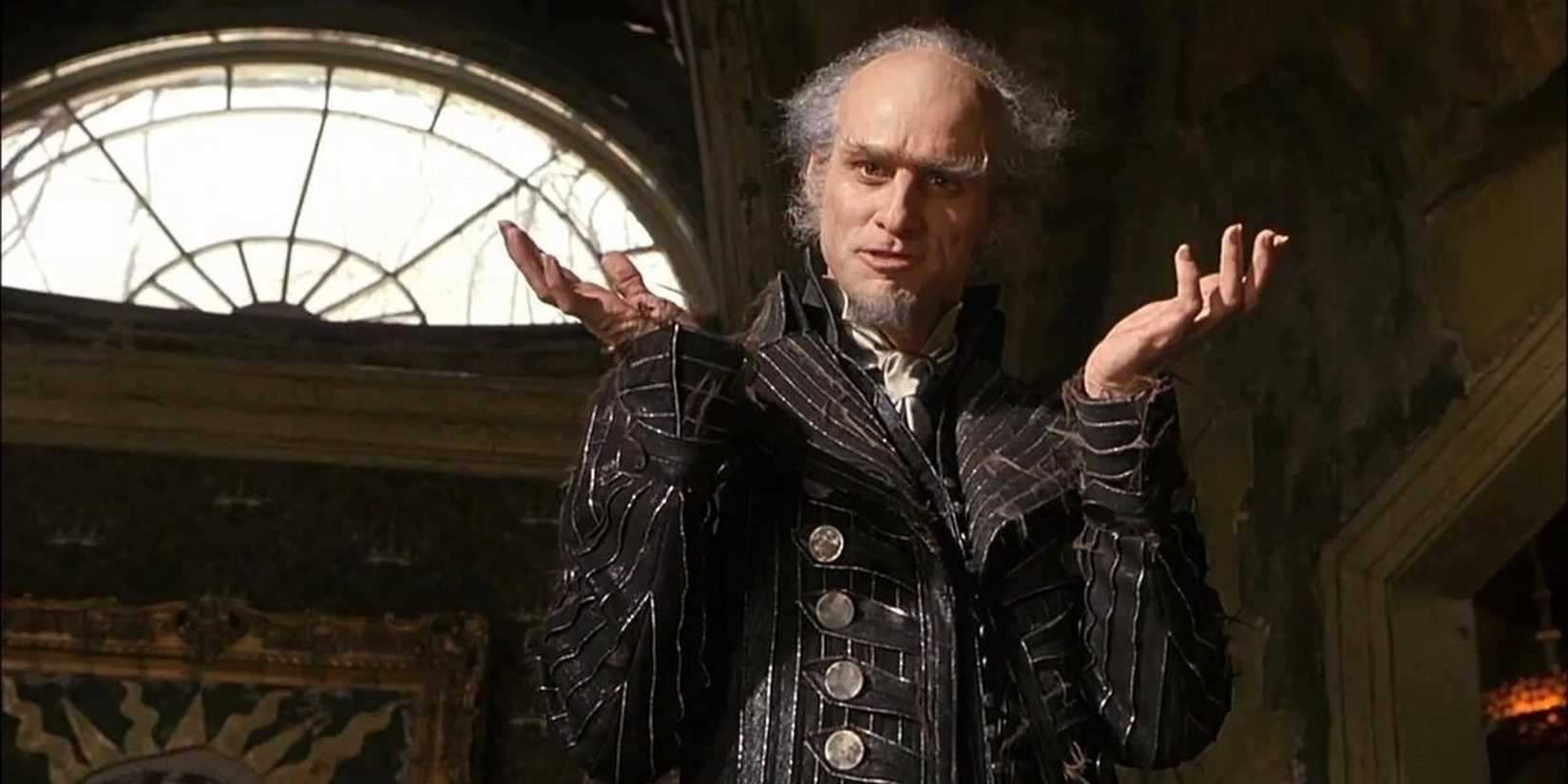 Jim Carrey as Count Olaf shrugging in Lemony Snicket's A Series of Unfortunate Events