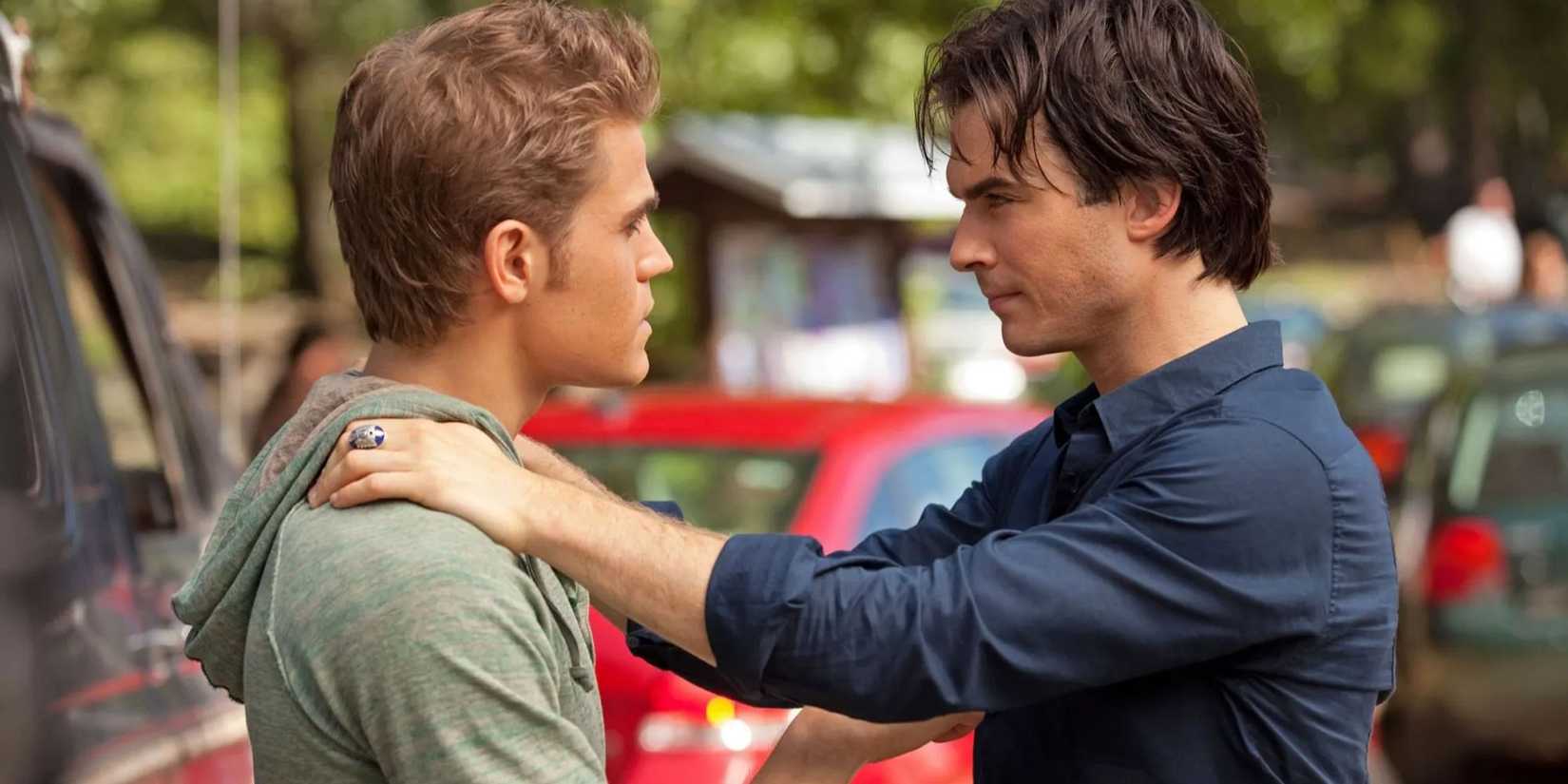 Paul Wesley and Ian Sommerhalder as Stefan and Damon Salvatore facing each other in The Vampire Diaries