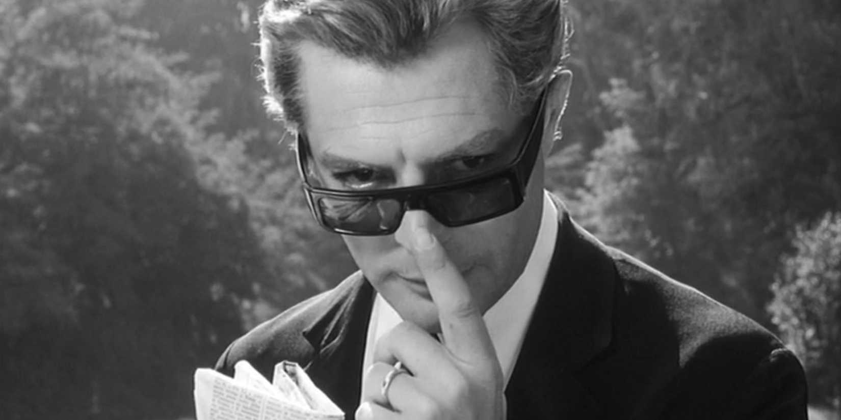 Marcello adjusting his shades in 8 1/2