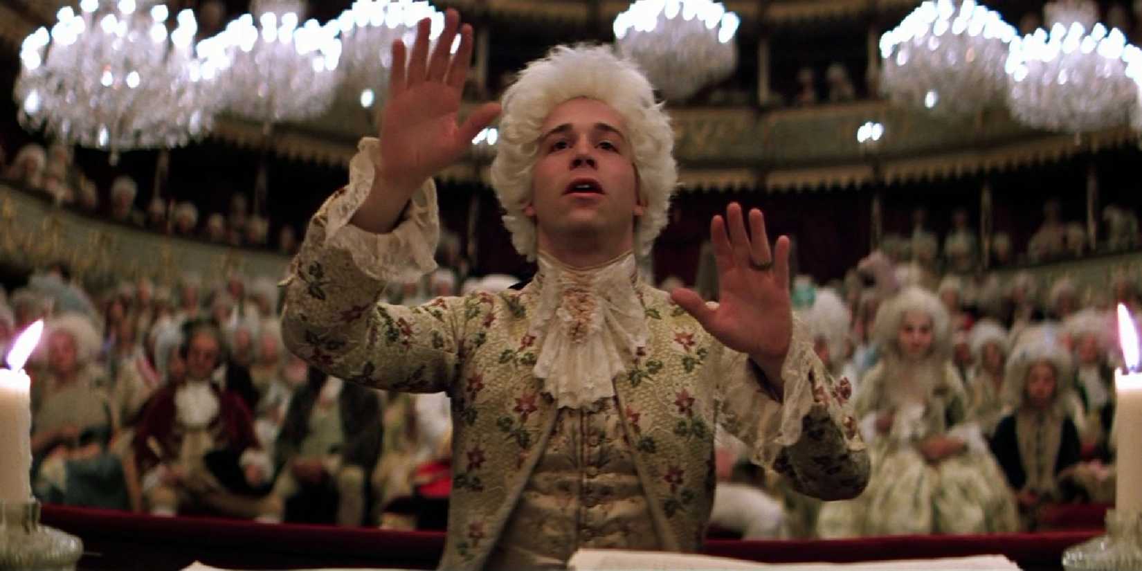 Mozart confucting in front of a packed audience in Amadeus