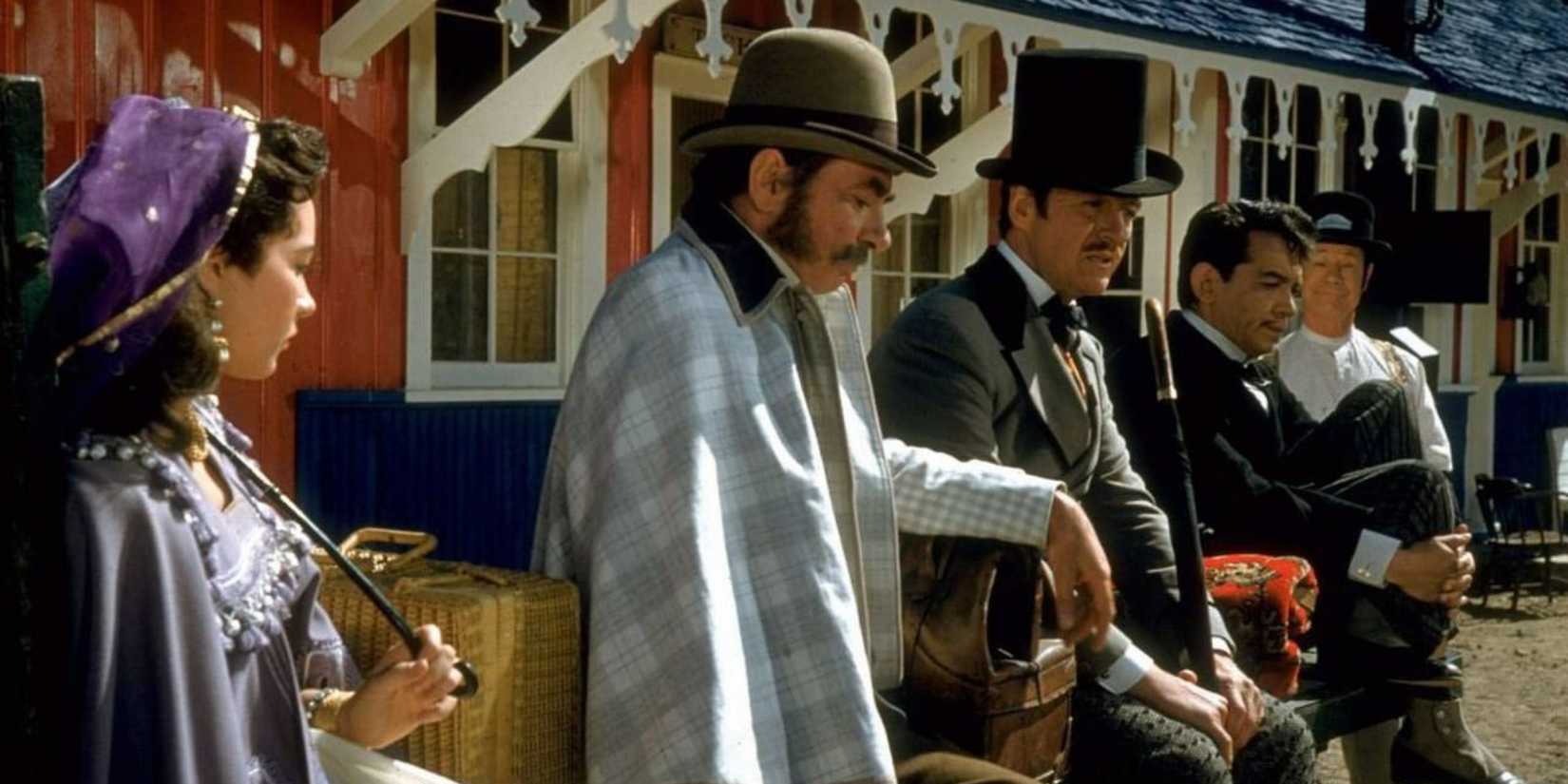 Phileas and his companions from "Around the World in 80 Days"
