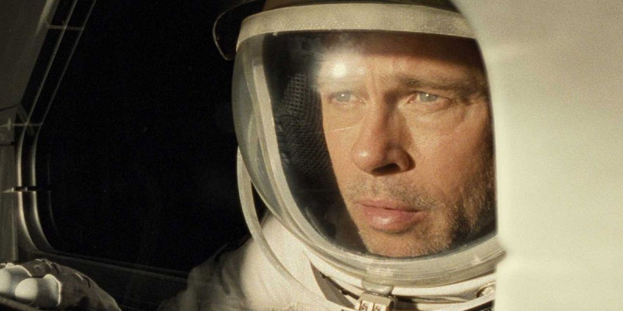 Roy McBride looking through his spacesuit in Ad Astra.