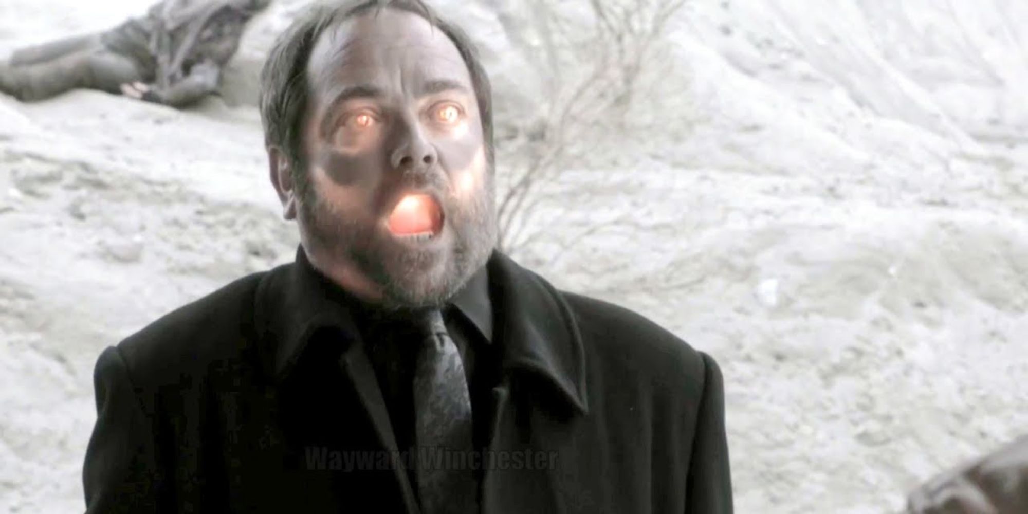 Crowley smiting himself with an angel blade.