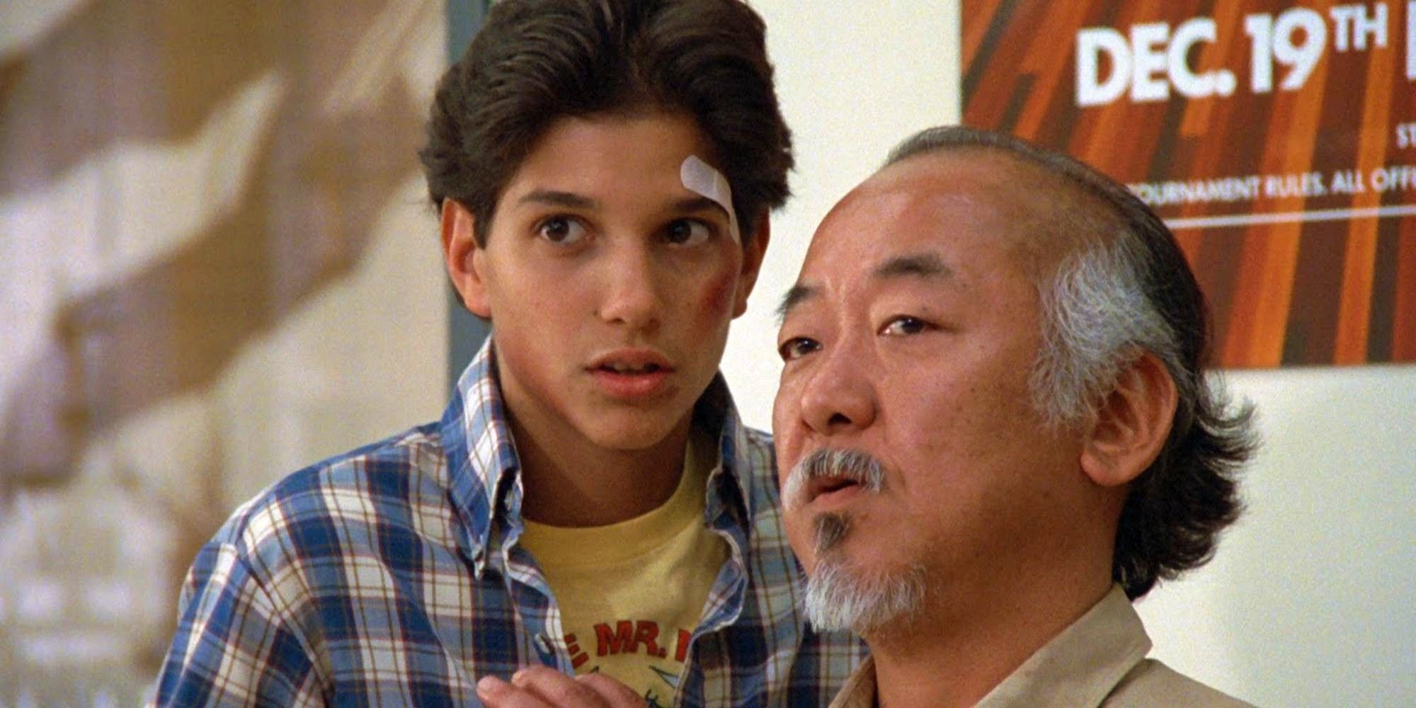 Ralph Maccio and Pat Morita look to the distance in The Karate Kid