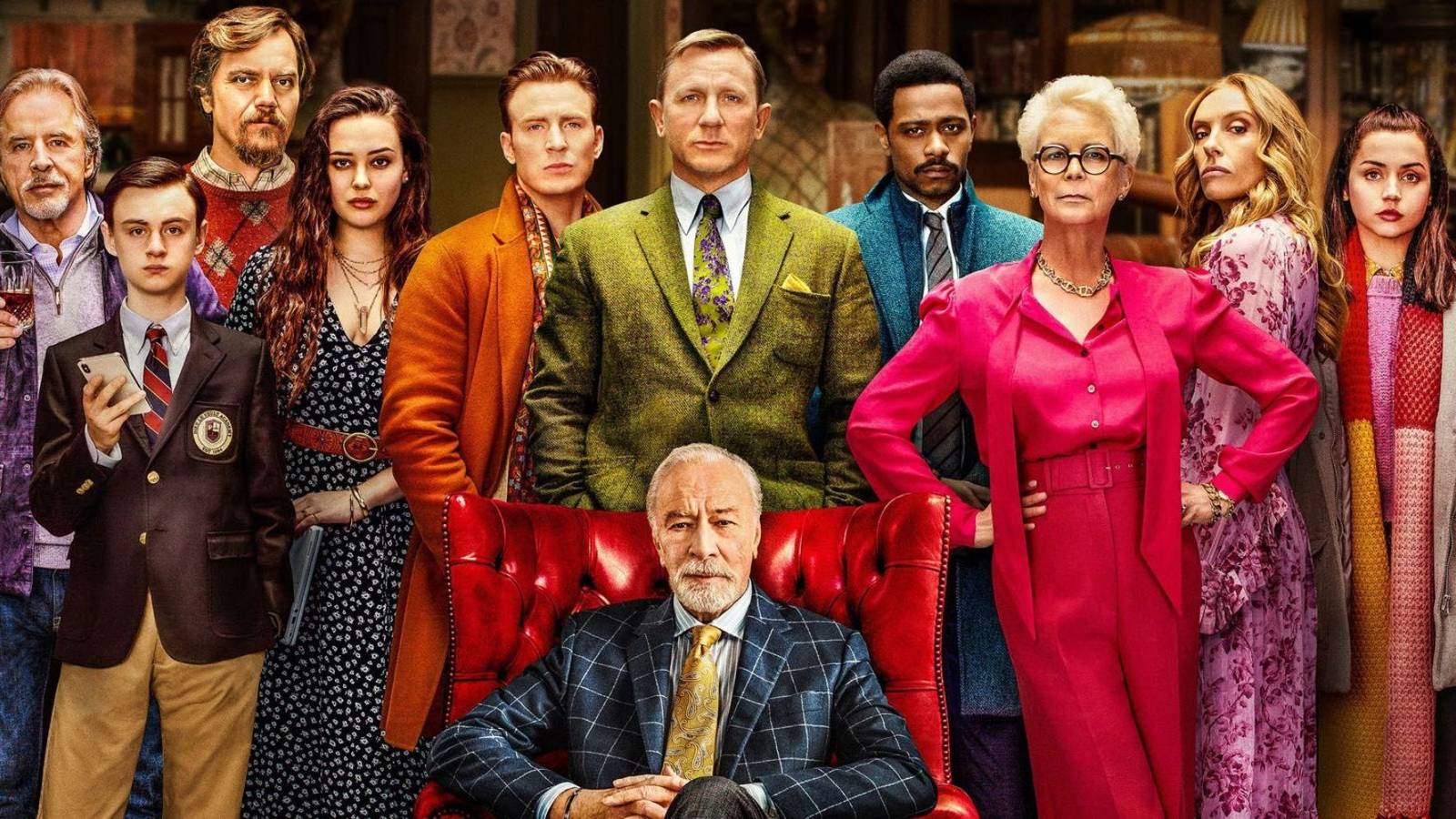 The main characters of Knives Out looking at the camera in the film's poster.