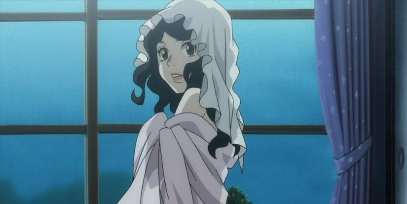 Tsukimi Kurashita standing at a window staring backwards in Princess Jellyfish
