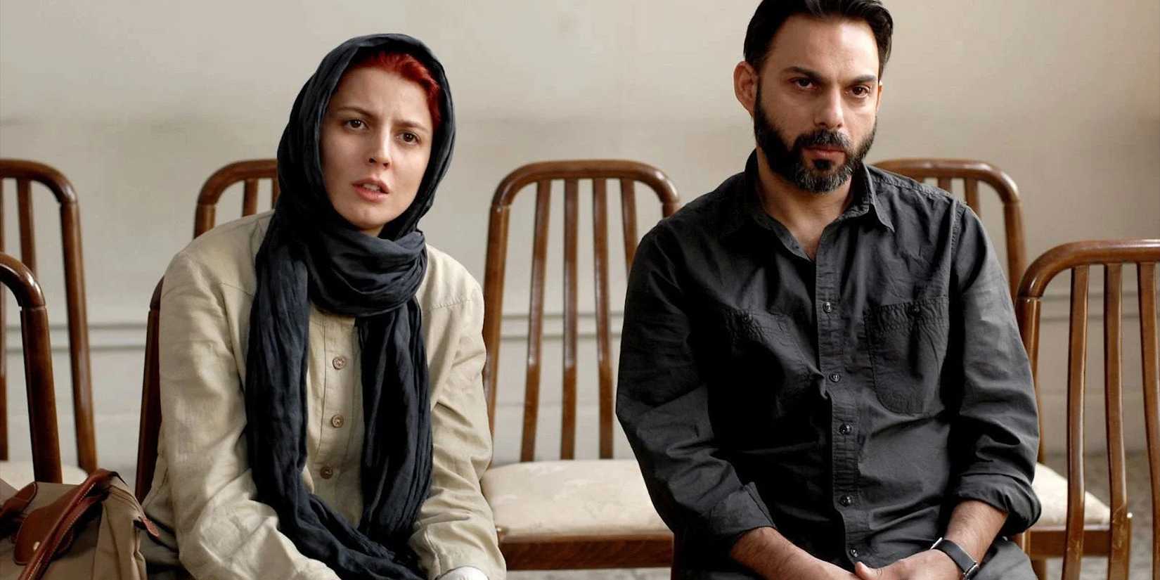 A woman and a man looking ahead in A Separation