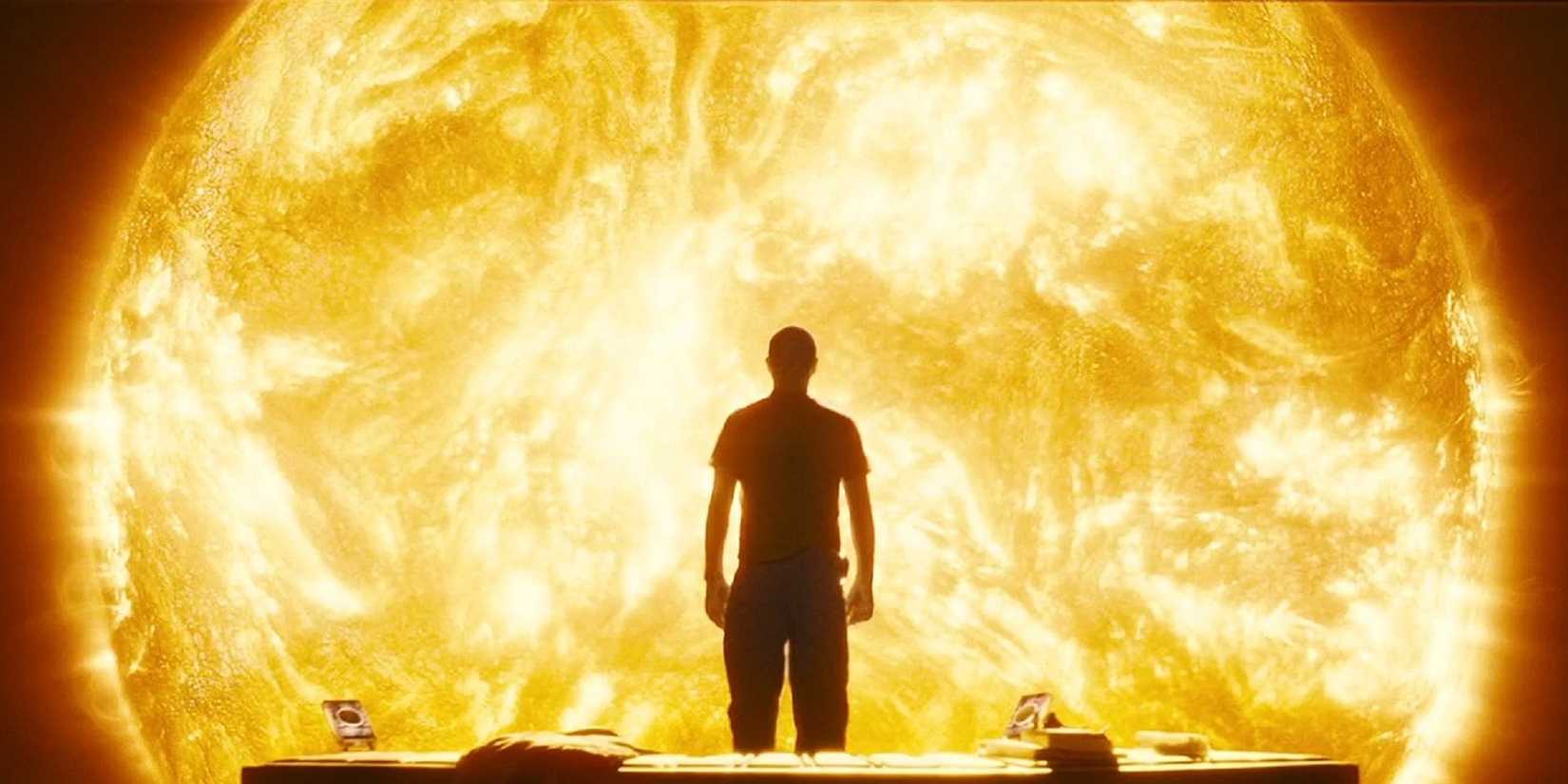 Cliff Curtis standing in front of the sun in Sunshine.