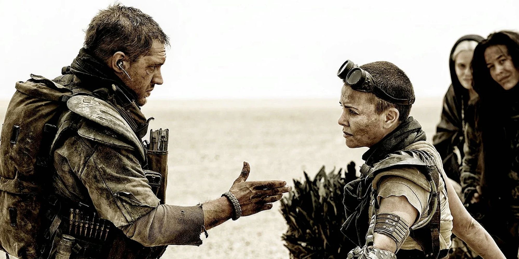 Max offering his hand to Furiosa in 'Mad Max Fury Road'.