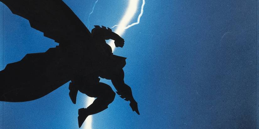 Batman melompat ke depan dengan bulan di latar belakang di Batman: The Dark Knight Returns