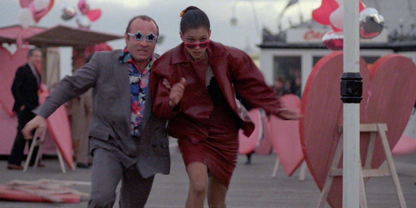 A man and a woman running in Mona Lisa - 1986