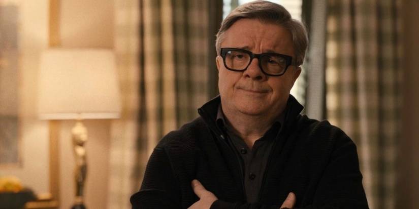 Nathan Lane as Teddy Dimas with his arms crossed in Only Murders in the Building.