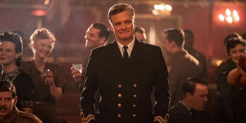Colin Firth smiling in Operation Mincemeat
