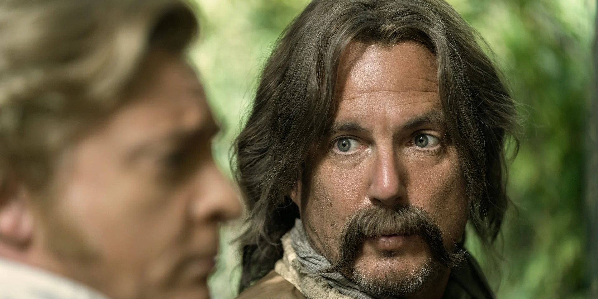 Will Arnett, as Calico Jack in 'Our Flag Means Death', looks to his right with a shocked expression.