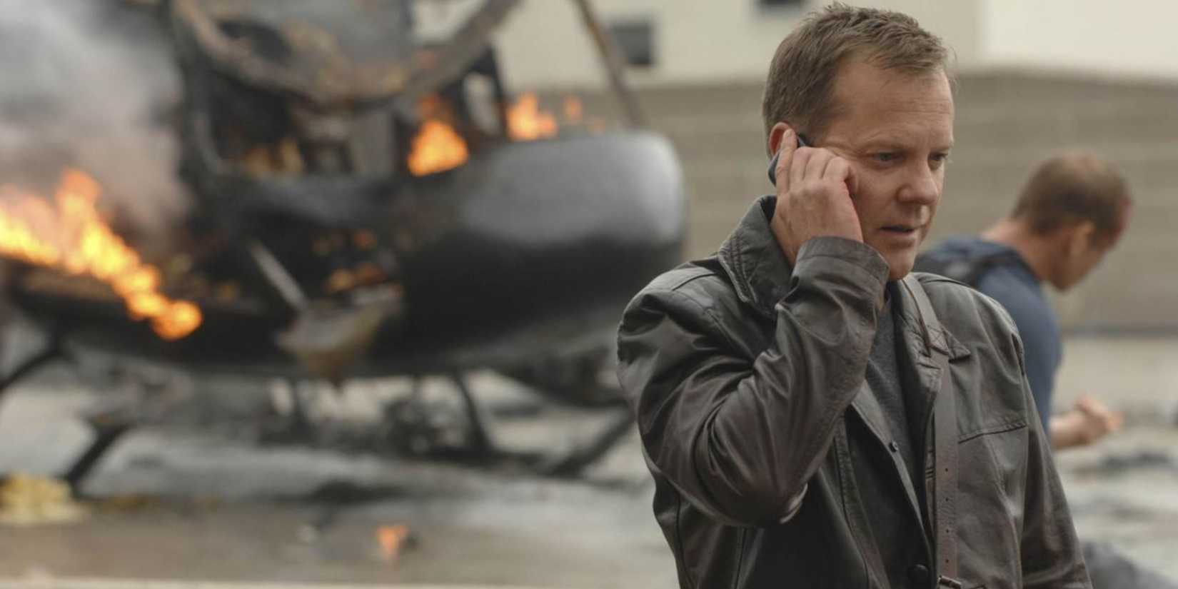 Jack Bauer on the phone in 24, a helicopter in flames behind him