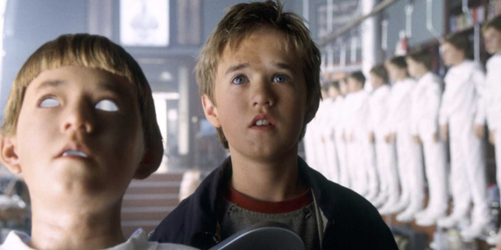 David looking in awe as other robot children surround him in A.I. Artificial Intelligence.