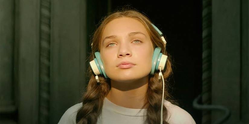Maddie-Ziegler with headphones in Music