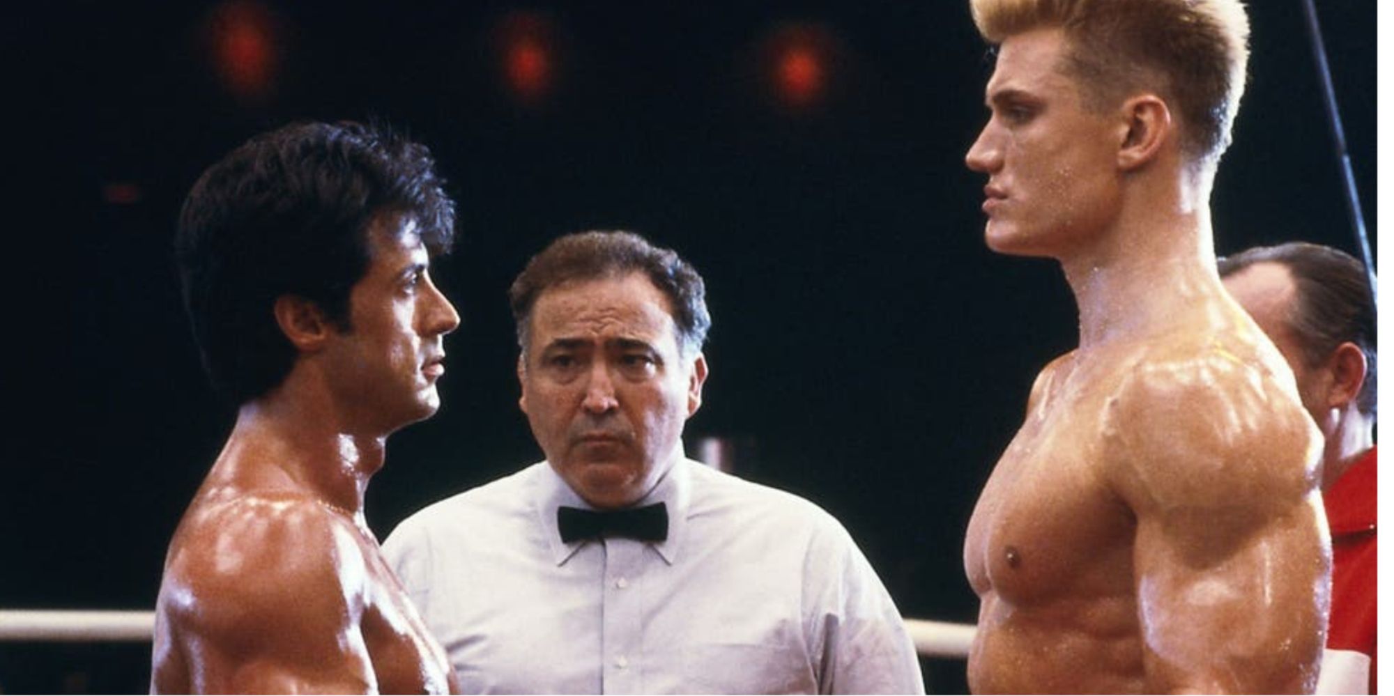 Sylvester Stallone and Dolph Lundgren in the ring about to fight 