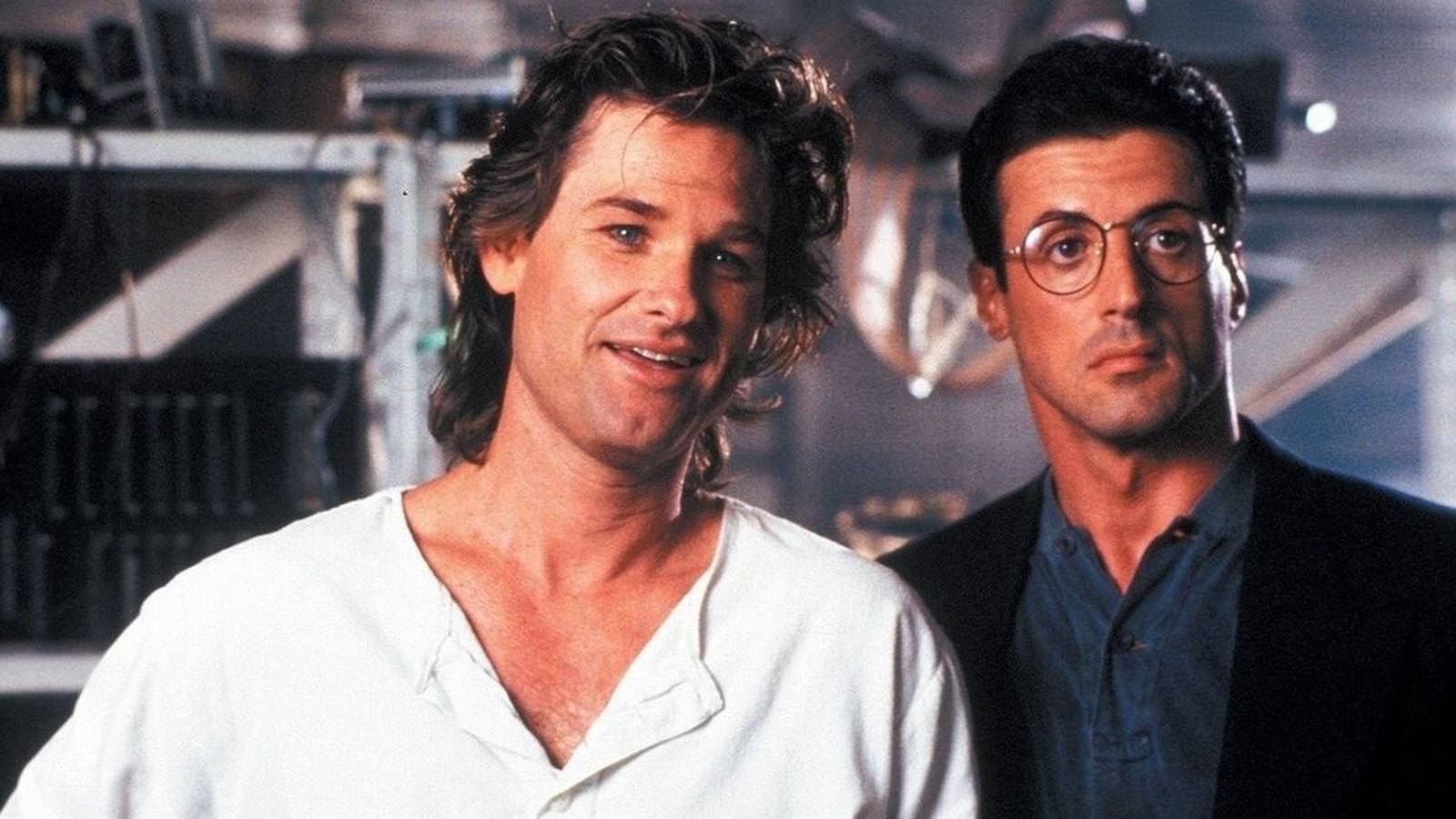Kurt Russell and Sylvester Stallone looking in the same direction in Tango & Cash.