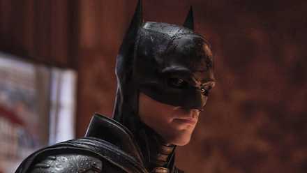 Robert Pattinson as Batman looking intently in The Batman.