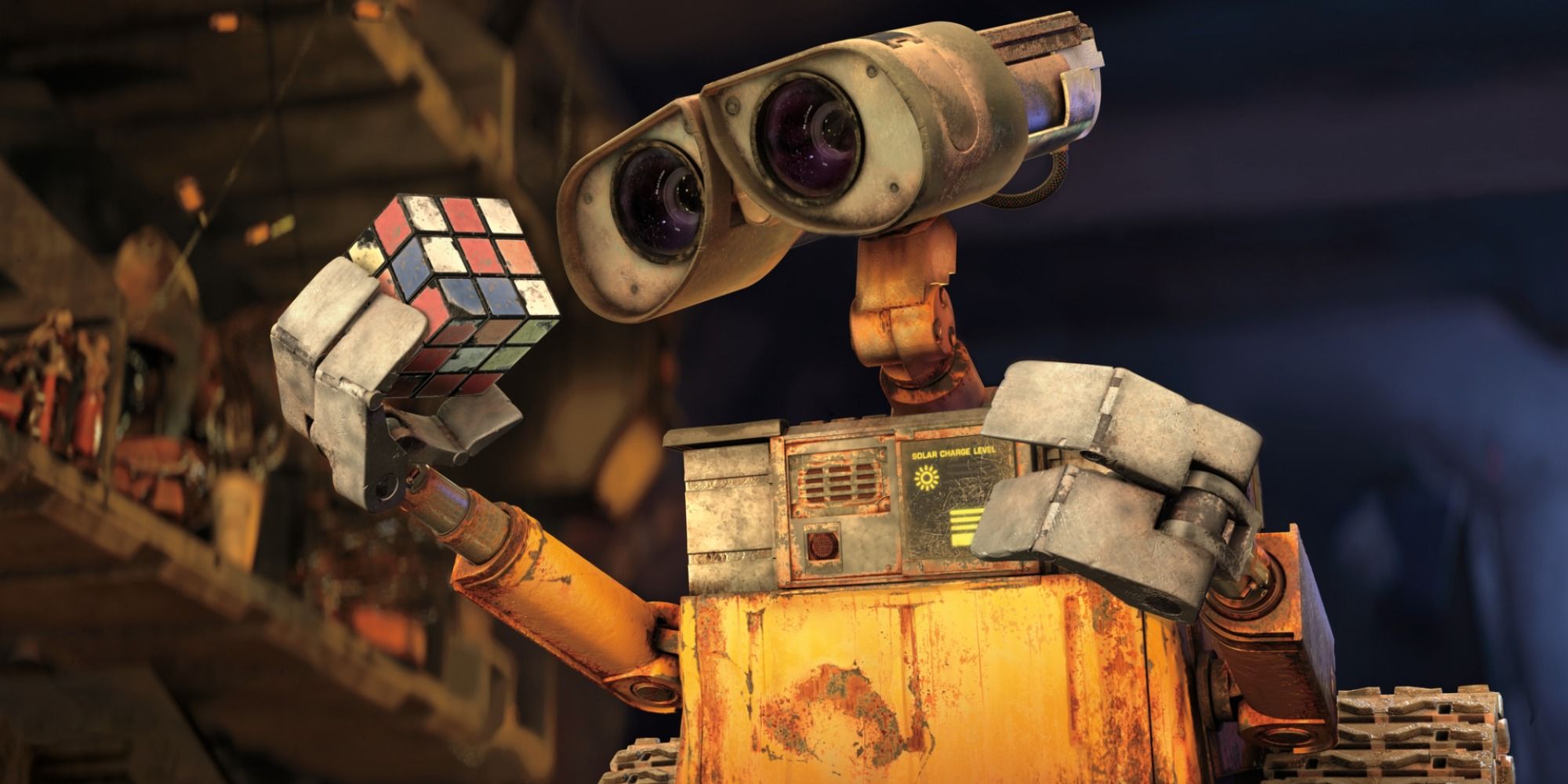 Wall - E looking at a Rubik's Cube 