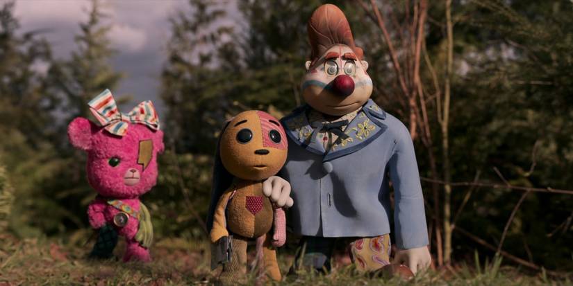 Three claymation characters stand on a hill and look into the distance in Lost Ollie.