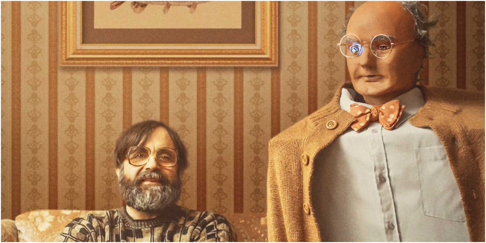 A man next to a robot in Brian and Charles