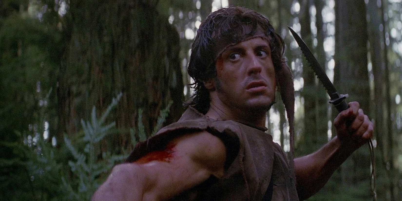 John Rambo, played by Sylvester Stallone, holds a knife in 'First Blood'.