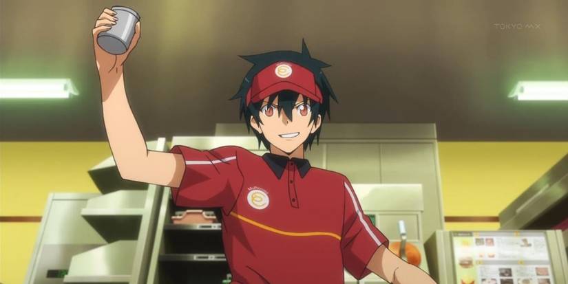 A young man raising his hand and smiling in the-devil-is-a-part-timer